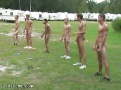 Six boys work out naked under coachs supervision