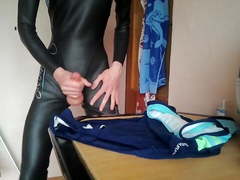 Young boy with neoprene suit cum on swimsuit