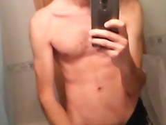 PIERCED GUY JERKING AND CUMMING HARD IN FRONT OF MIRROR