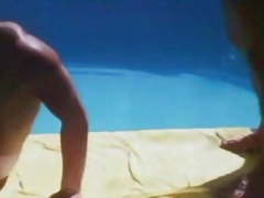 Vintage pool boy and sunbather