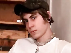 Cigar smoking twink jerks off hairy cock and jizzes in tray